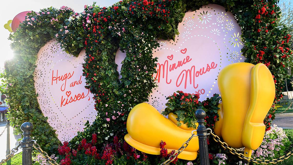 A decorative display with hearts, flowers, and Mickey Mouse shoes at Disneyland in Anaheim, CA, USA