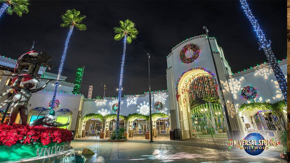 Looking at the entrance to Universal Studios in Hollywood at night with all of the Christmas lights and other holiday decorations up in Los Angeles, California, USA