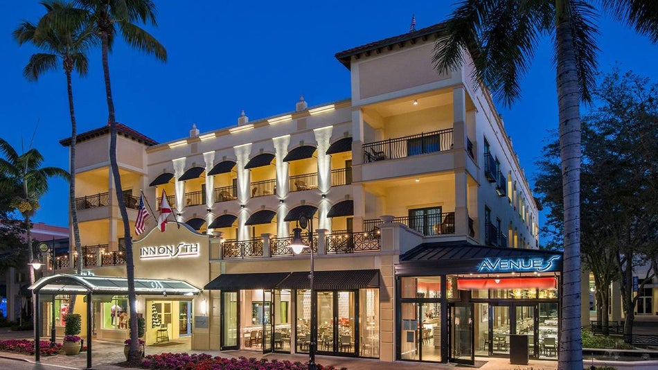 View of the exterior of the Inn on Fifth at twilight in Miami, Florida, USA