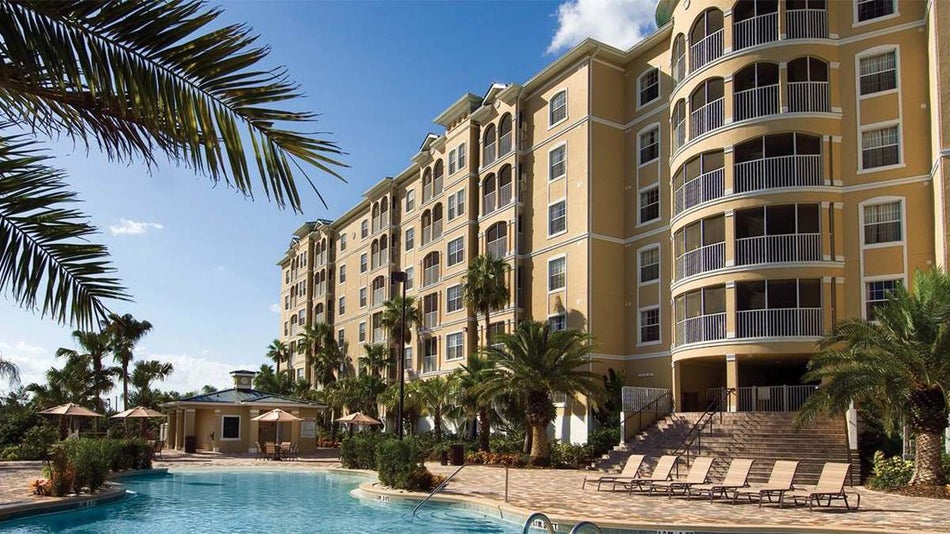 Wide shot of the miami-florida-usa-Mystic-Dunes-Resort-and-Golf-Club and pool on a sunny day in Miami, Florida, USA