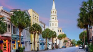 view down the city and downtown streets with palm trees in Charleston near Myrtle Beach, South Carolina, USA