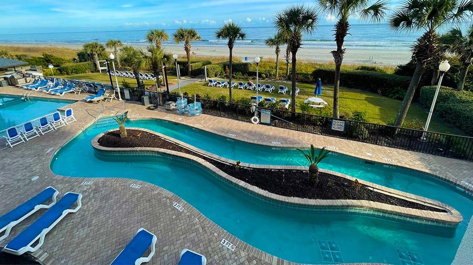 exterior view of the outdoor pool in Grande Shores Ocean Resort in Myrtle Beach, South Carolina, USA