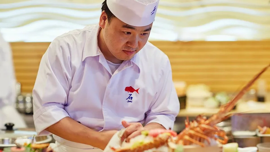 Close up photo of a sushi chef at work at Sushi Seki in NYC, New York, USA.