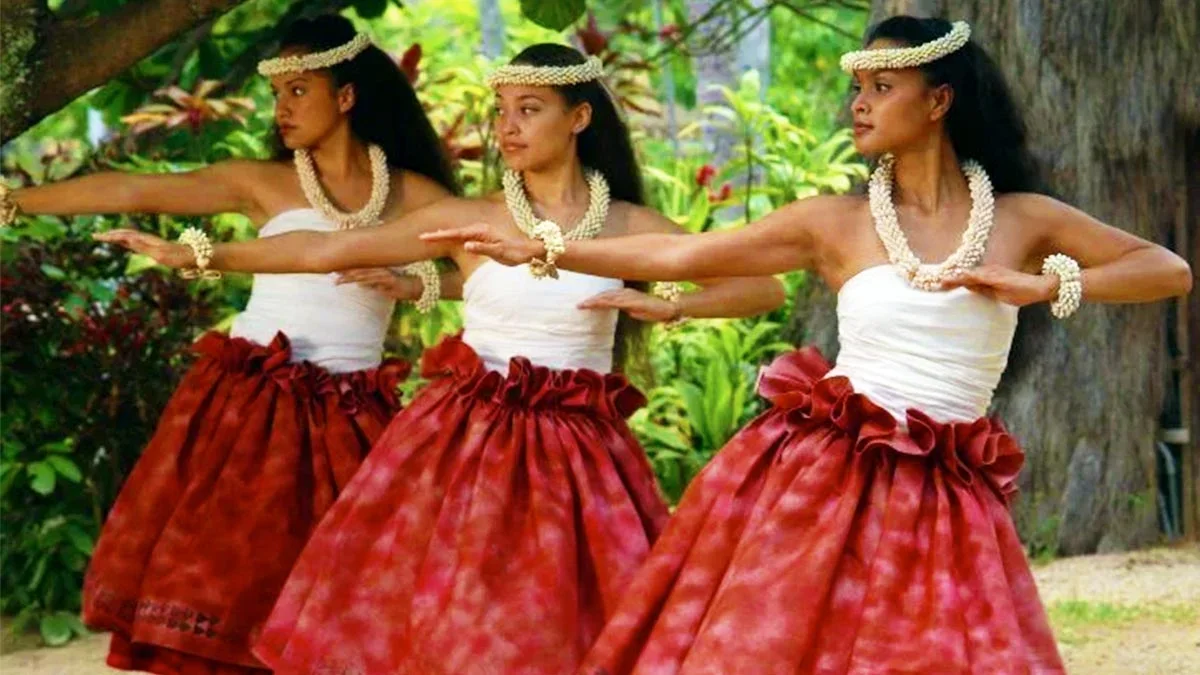 3 Hawaiian women dancing at the Polynesian Cultural Center - Oahu, Hawaii, USA
