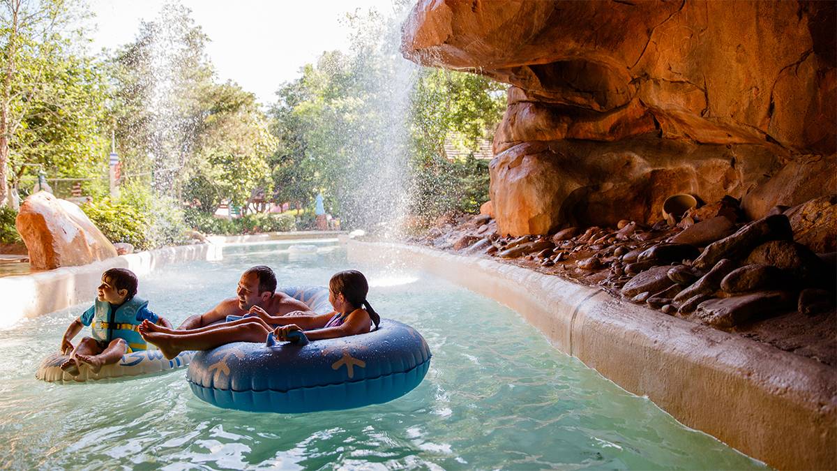 Family Floating down the Cross Country Creek at Disney’s Blizzard Beach Water Park - Orlando, Florida, USA