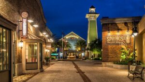Ground view of Disney Springs shops at night in Orlando, Florida, USA