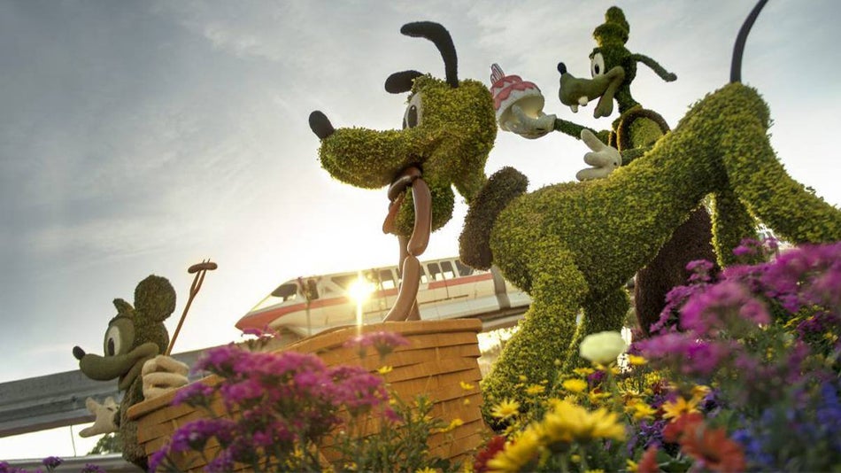 Mickey, Pluto, and Goofy Garden Sculptures at Disney's Epcot International Flower & Garden Festival - Orlando, Florida, USA