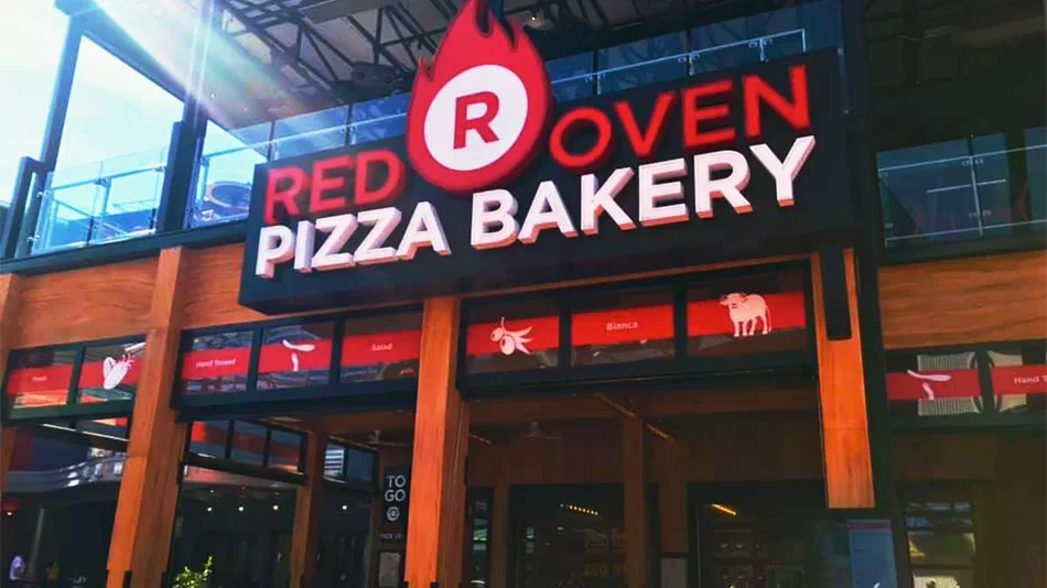 exterior of Red Oven Pizza Bakery during day at Universal Studios Orlando - Orlando, Florida, USA