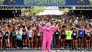 A crowd of people in their running gear ready to run the Bay to Breakers 12k in San Francisco, California, USA