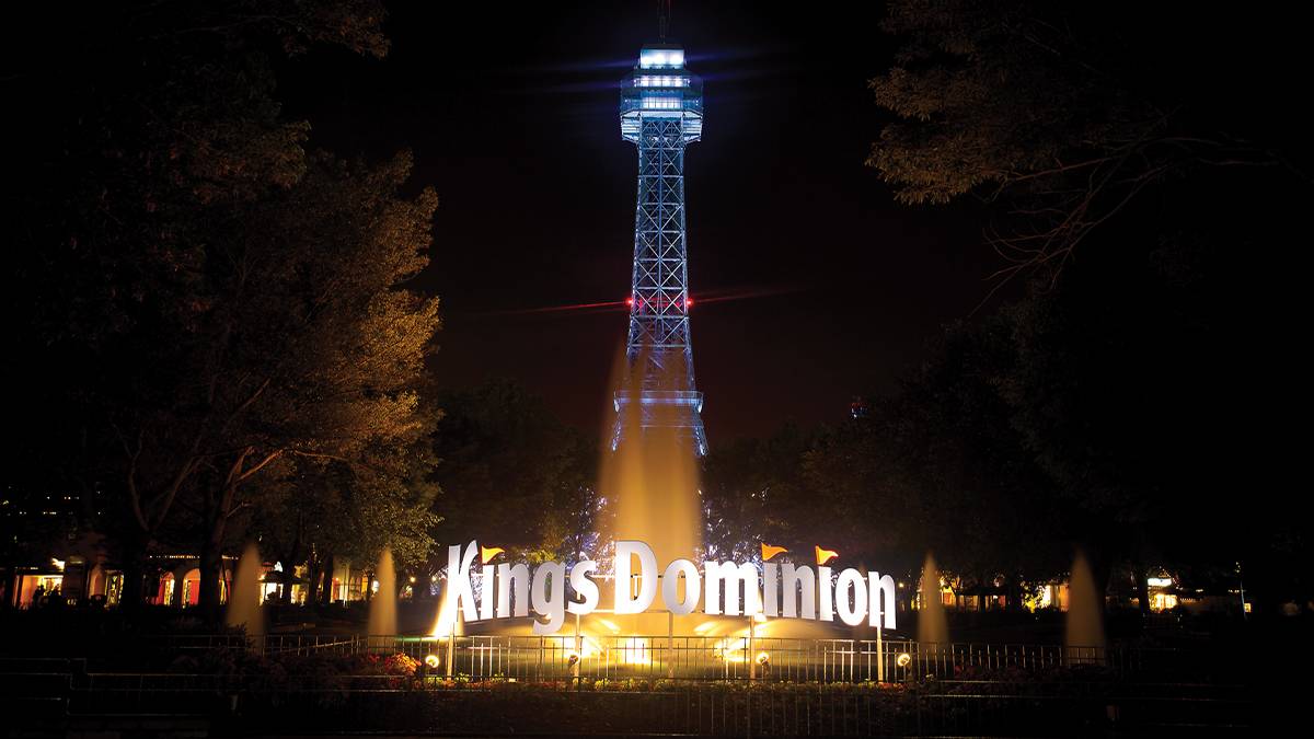 night view of Kings Dominion sign with yellow lights in Williamsburg, Virginia, USA