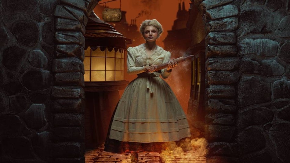 Woman standing in a colonial dress holding a rolling pin with flames and red lighting around her