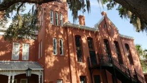 Exterior view of red brick old jailhouse in St Augustine Florida