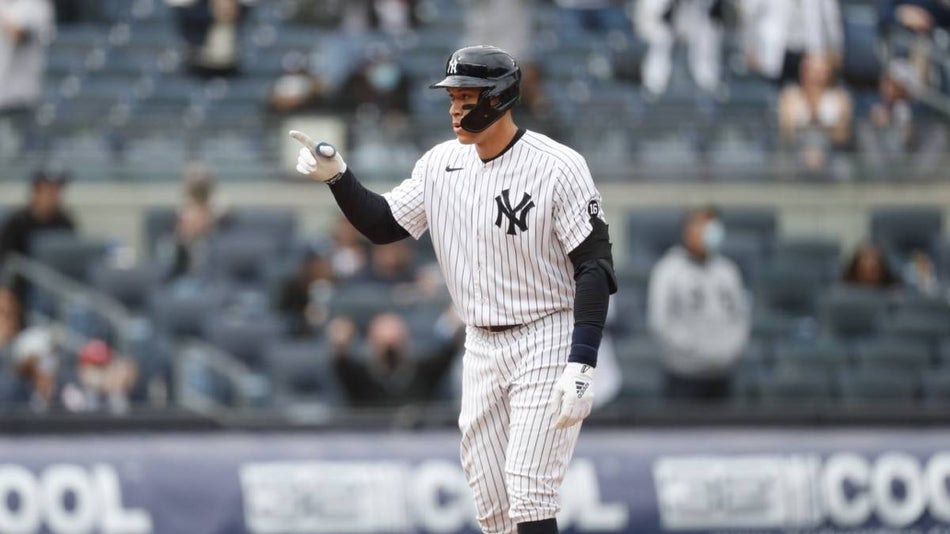 A new york yankees player with a helmet on