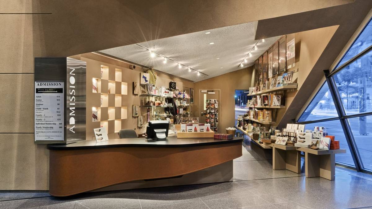 Admissions desk next to a gift shop at the Bata Shoe Museum