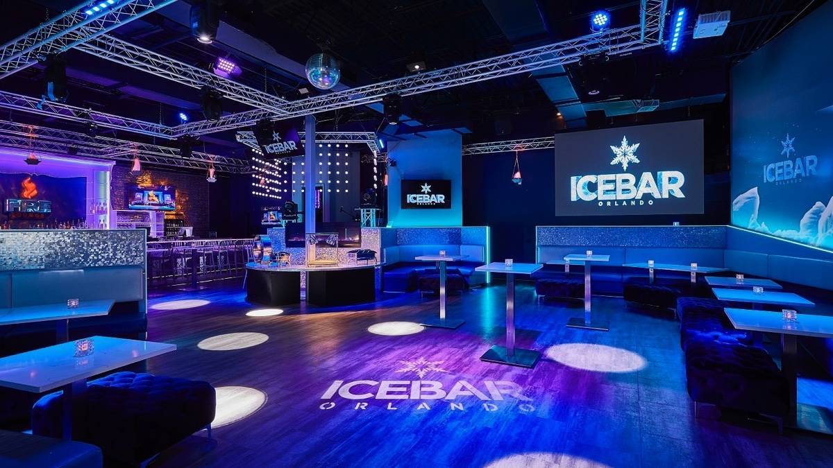 Dance floor surrounded by tables, and seating at Icebar in orlando