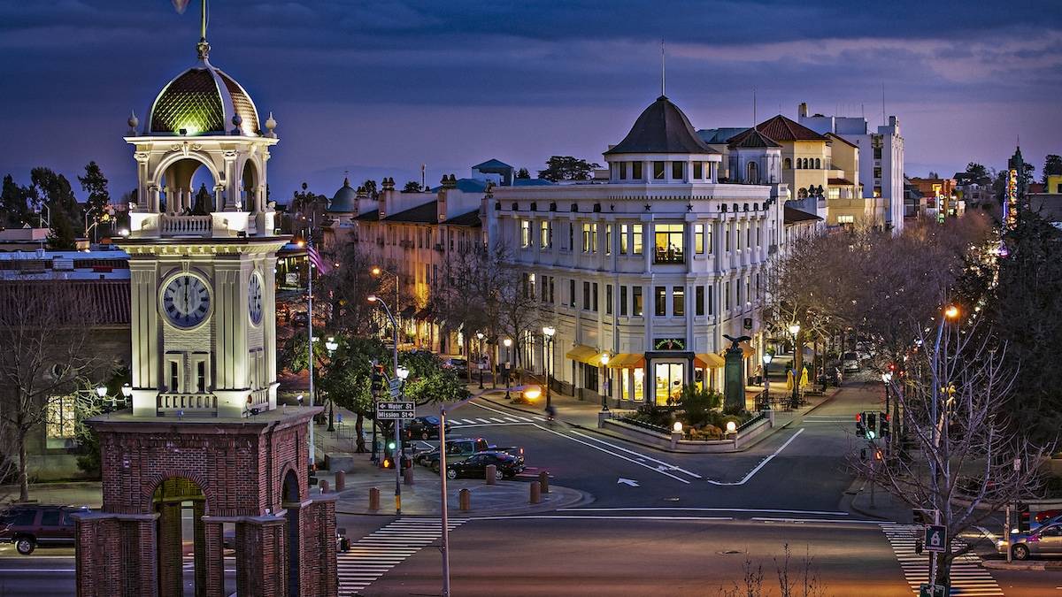 Shot of old buildings and a clock tower in downtown Santa Cruz at dusk