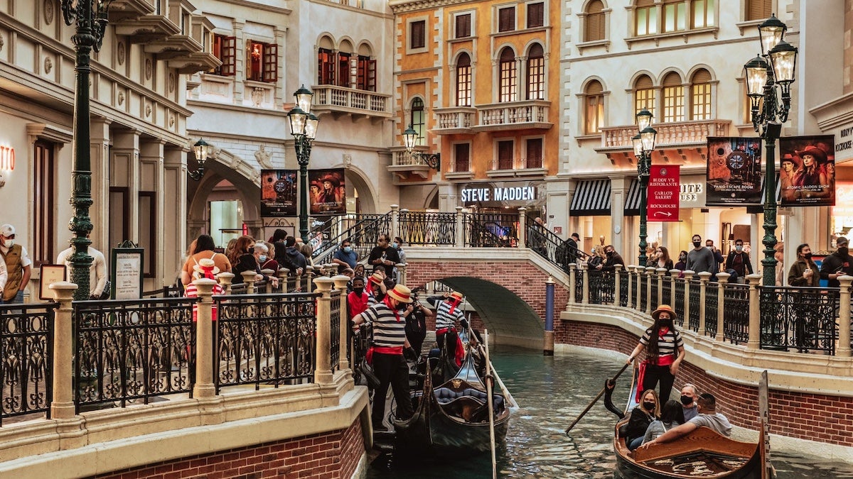 Canal winding through Italian like shops at the Venetian in Las Vegas