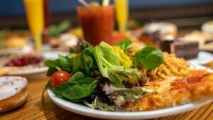 Close up of salad and pasta on a table