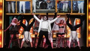 Performers on a stage for Zombie Burlesque.