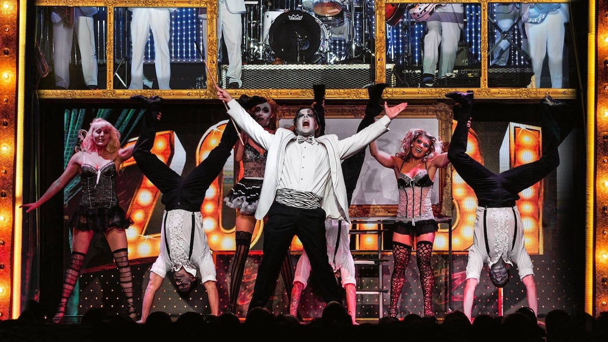 Performers on a stage for Zombie Burlesque.