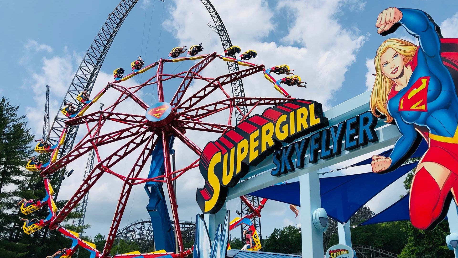 Amusement park ride in St Louis at Six Flags with a sign that has Supergirl on it