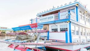 big white boat of Barefoot Queen