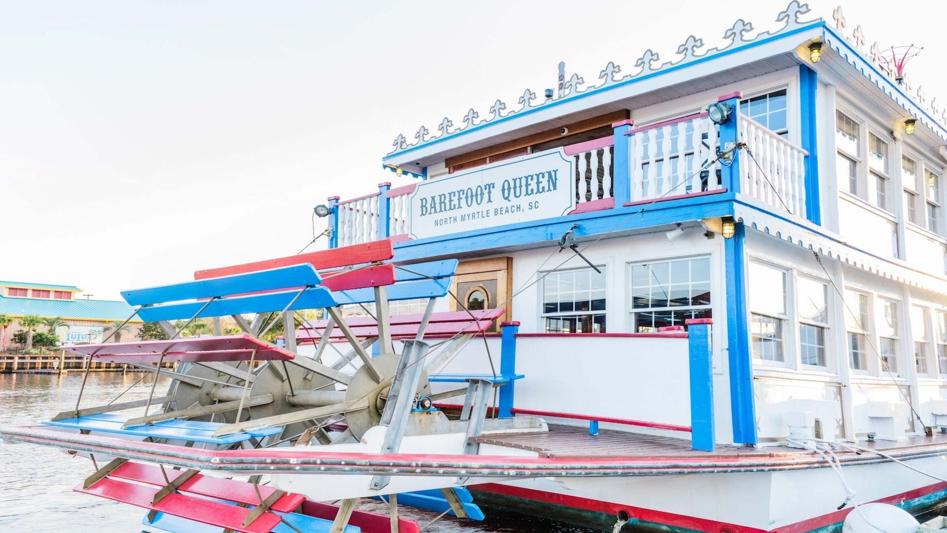 big white boat of Barefoot Queen