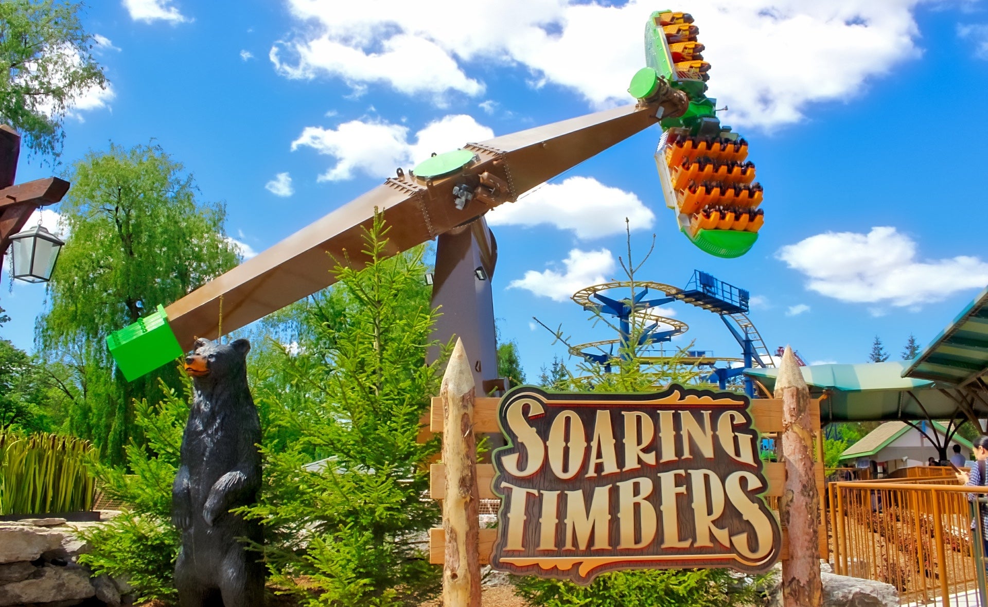 Amusement park ride called Soaring Timbers under a blue sky at Canada's Wonderland