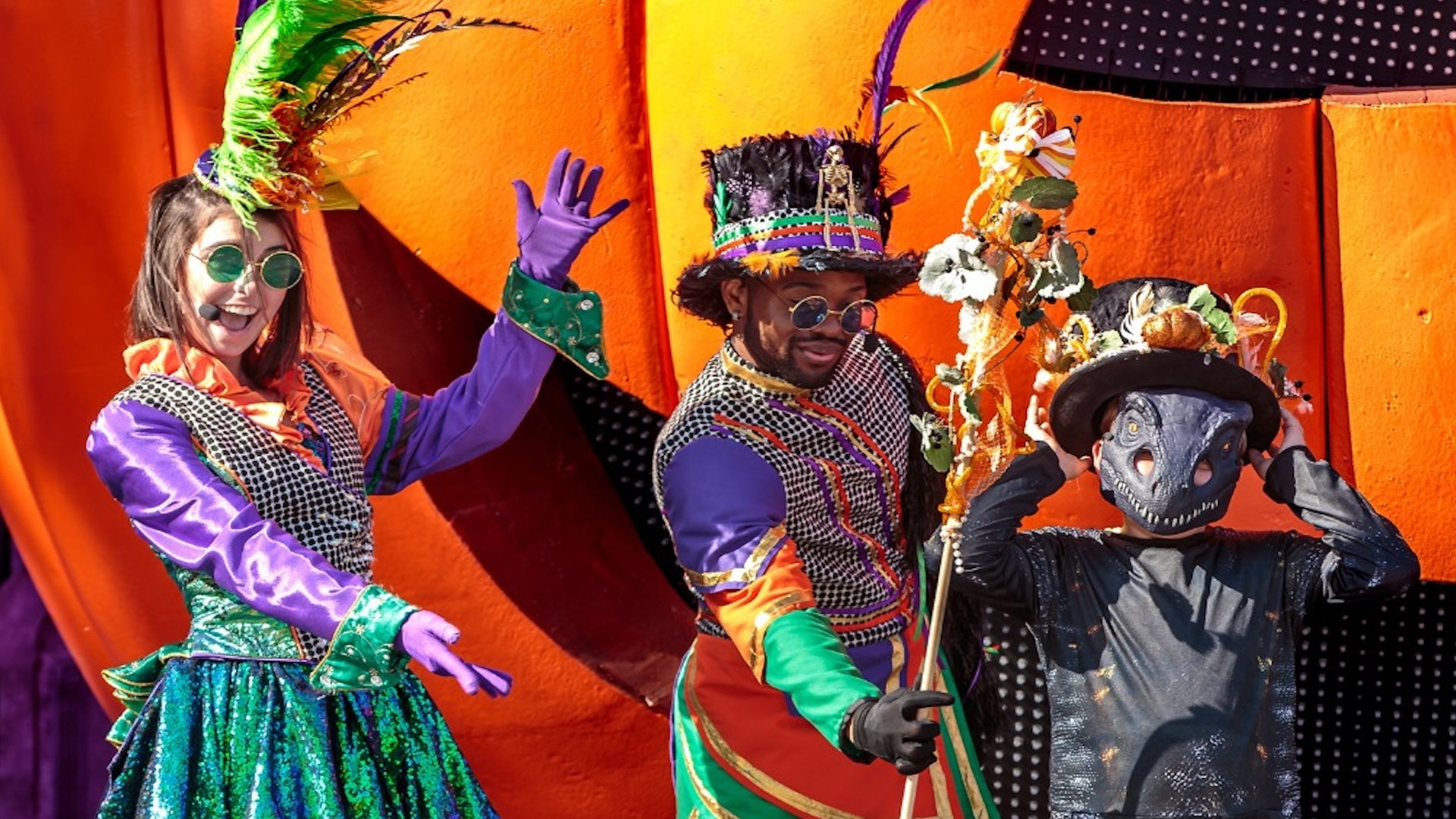 stage performers on colorful Halloween costumes