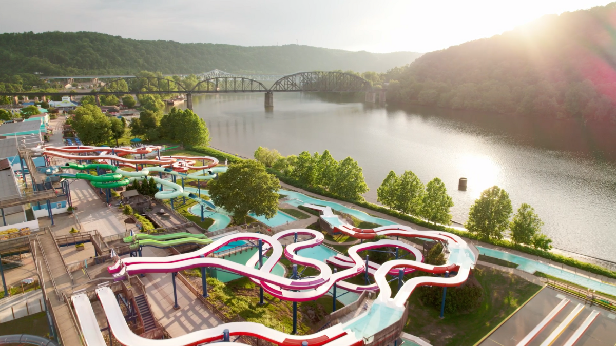 Aerial view of Sandcastle Waterpark showcasing water slides and the lazy river.