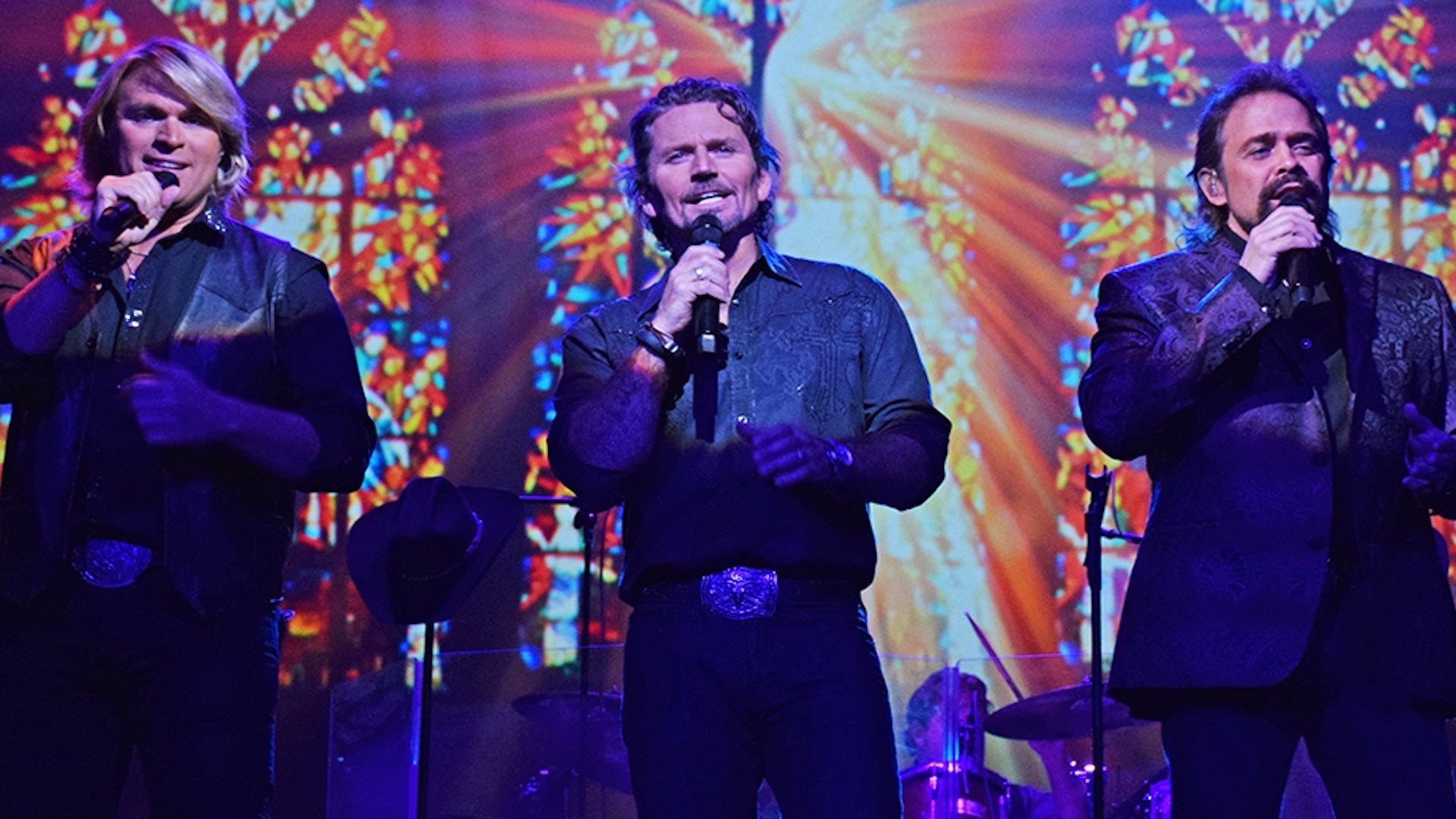 The Texas Tenors on stage singing