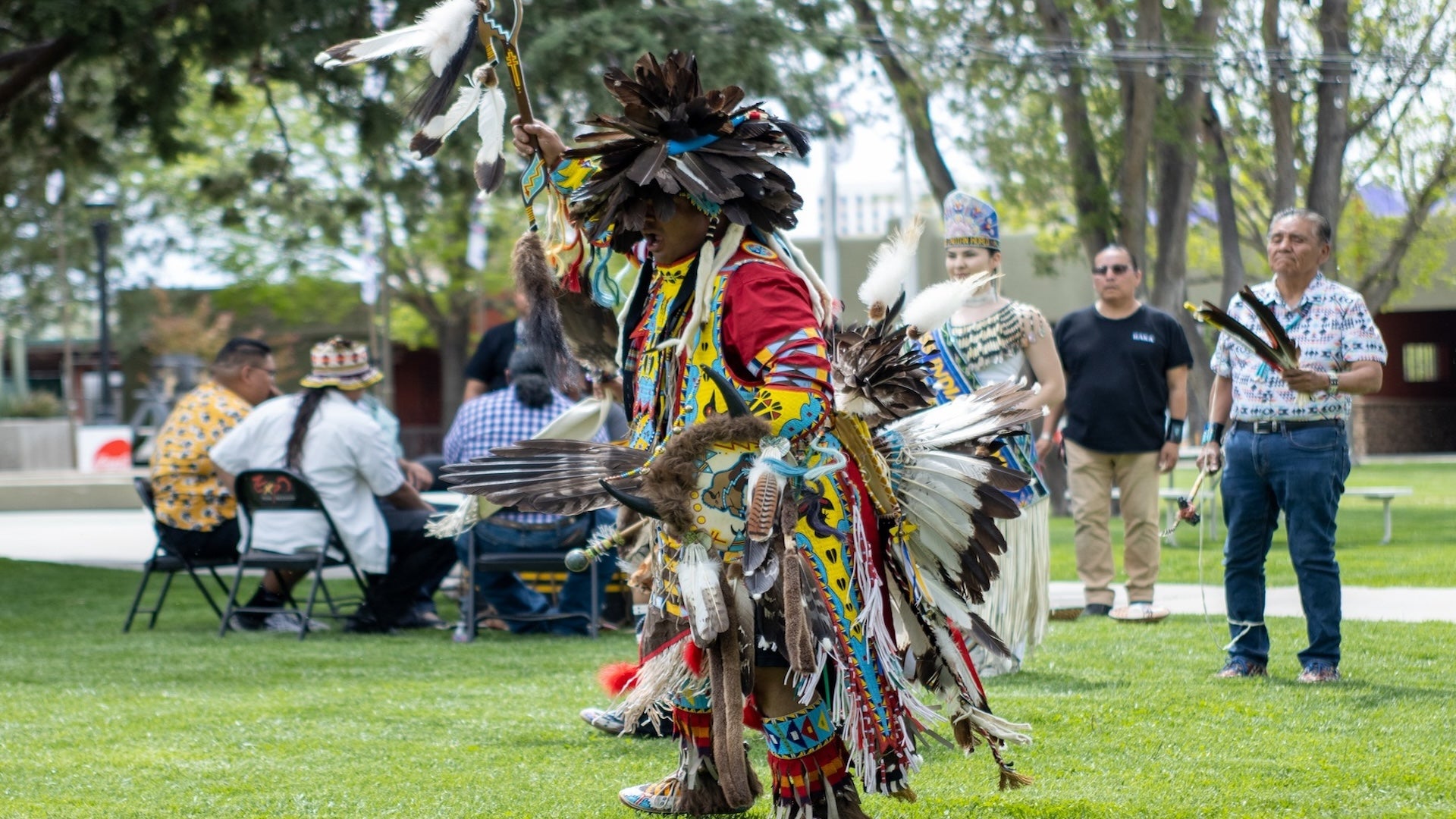 a man wearing a tribal costume