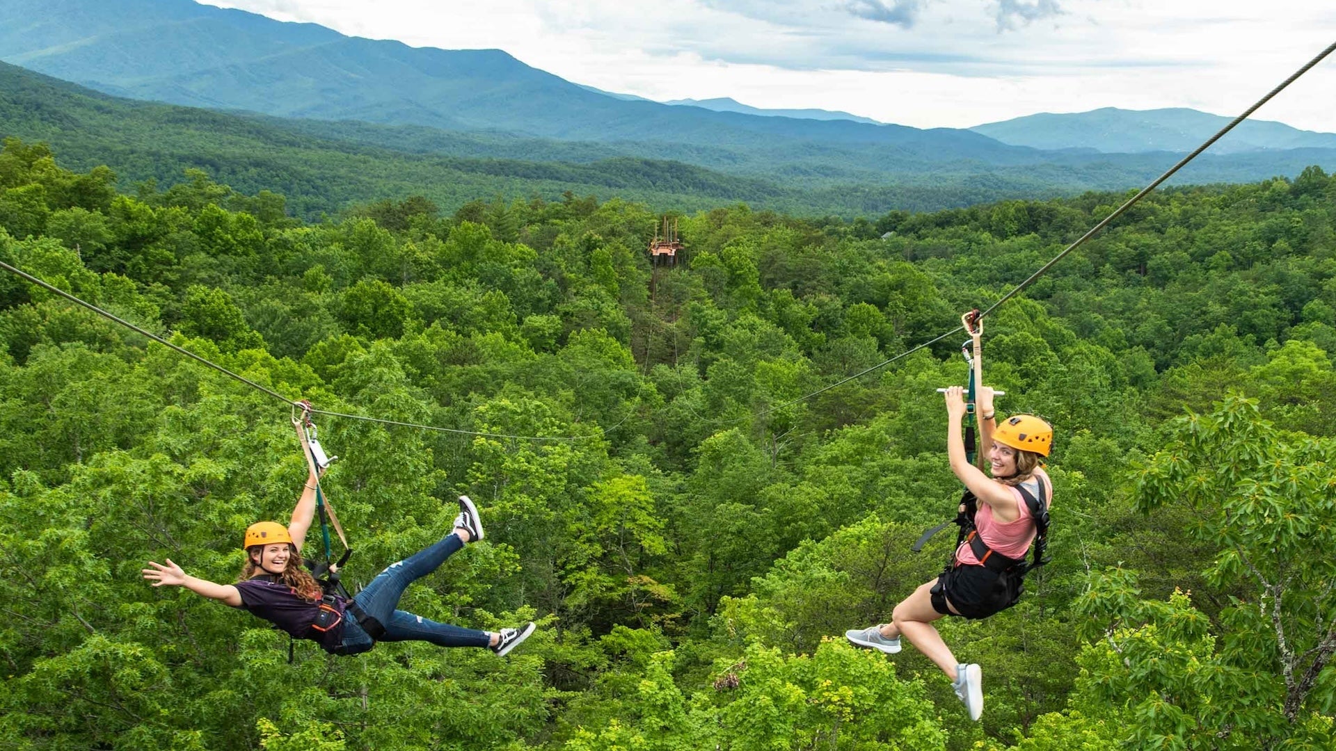 two friends ziplining