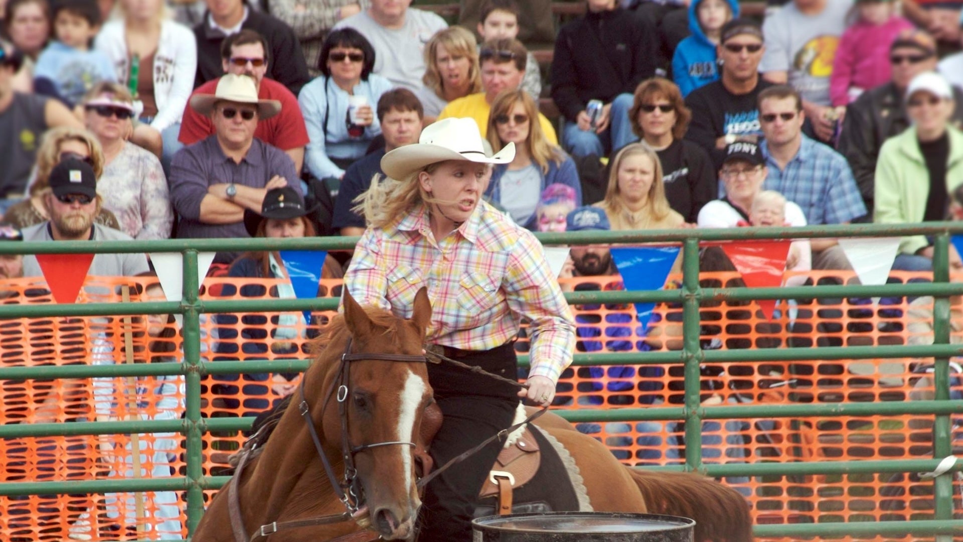 a woman riding a horse