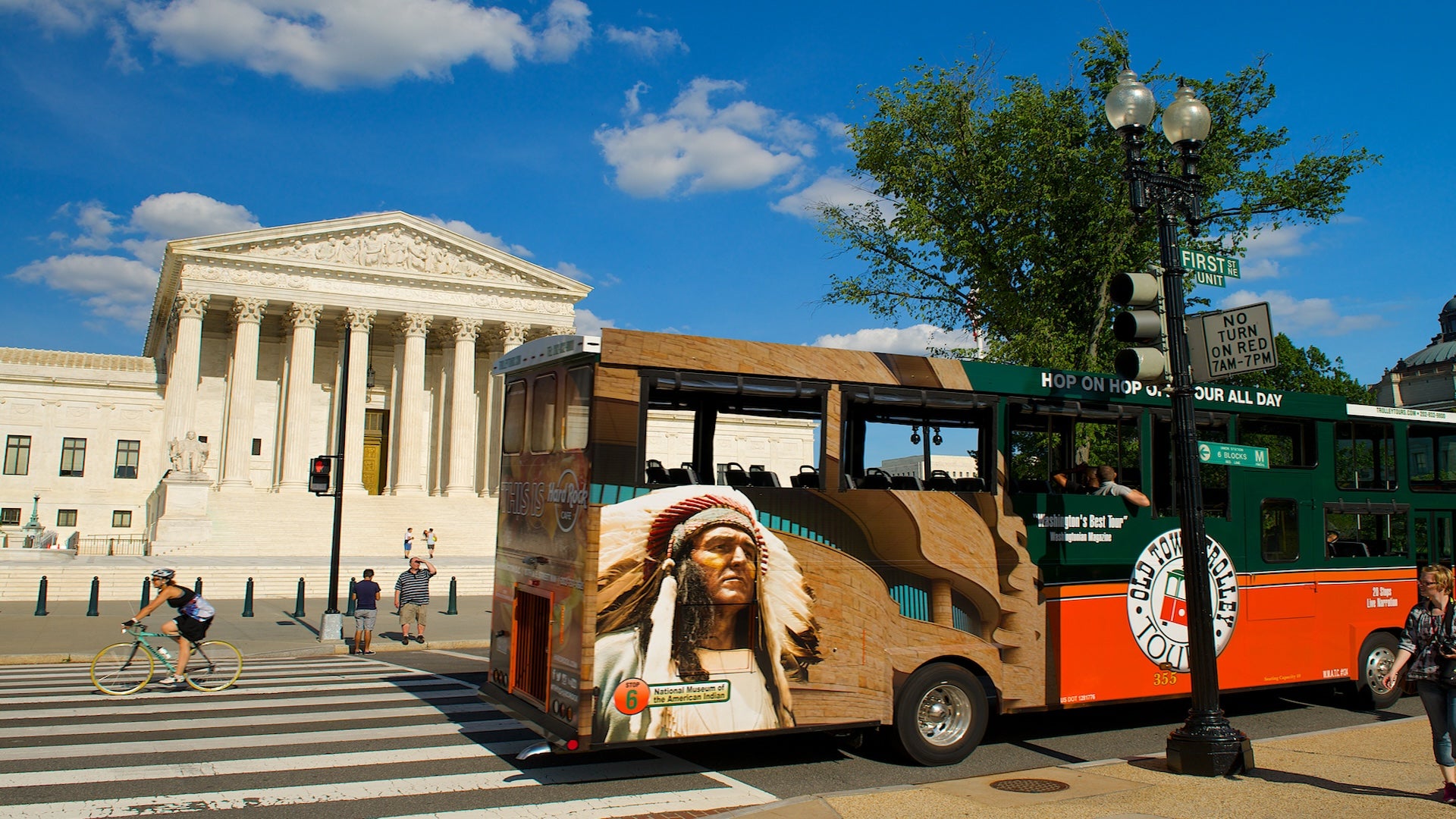 back view of hop on hop off-tour all day bus