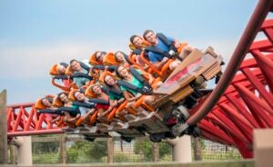 A roller coaster with riders on it