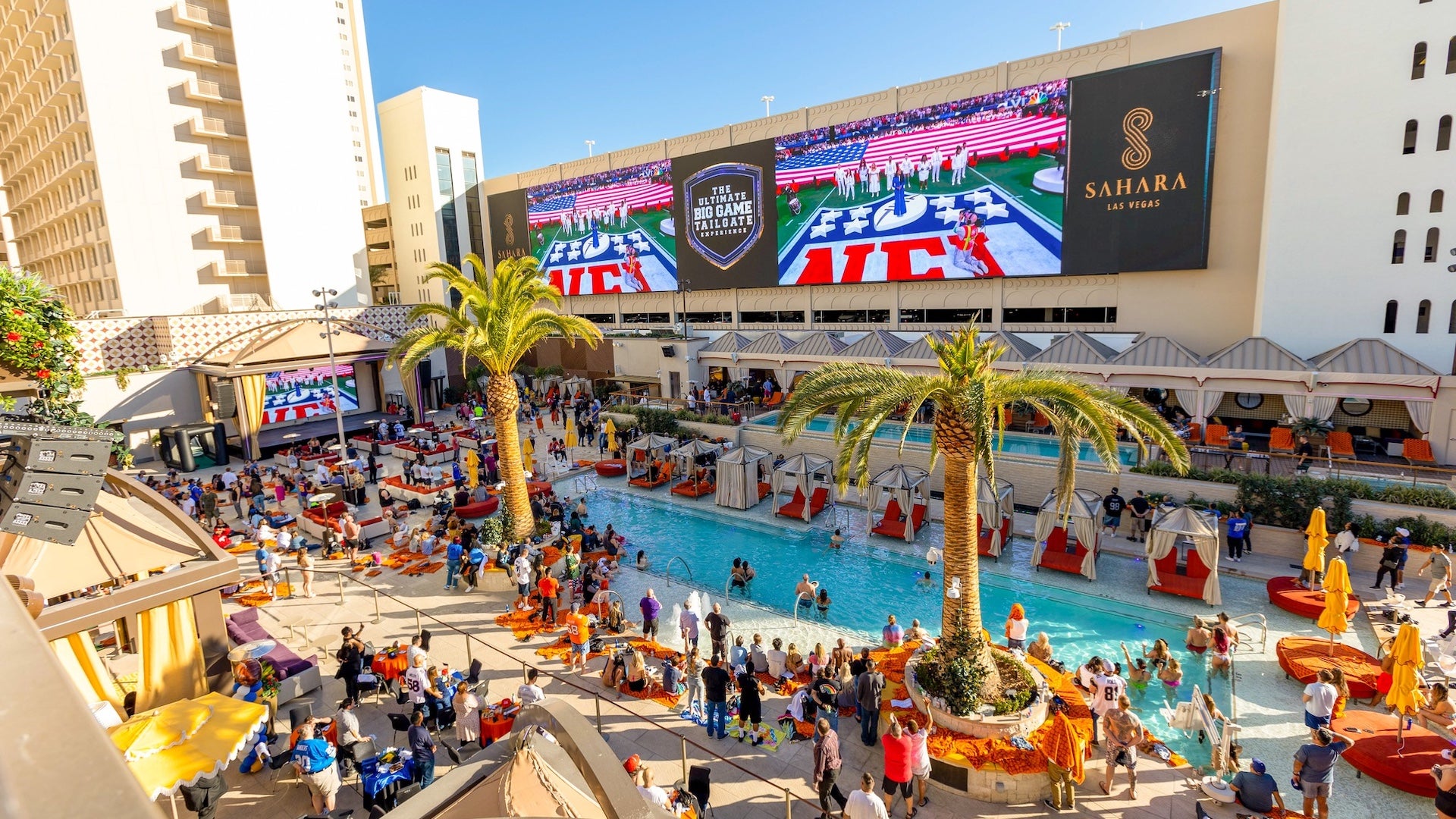 Moroccan themed pool with large tv screens at The Sahara