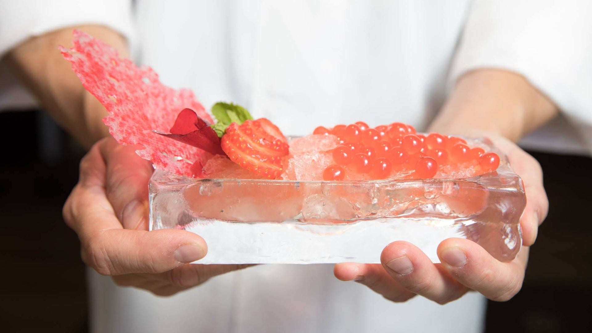 Champagne Shaved Ice. Champagne jelly, strawberry pearls fresh strawberries, raspberry roll up, bubble sugar and mint at Alexxa's Paris Las Vegas