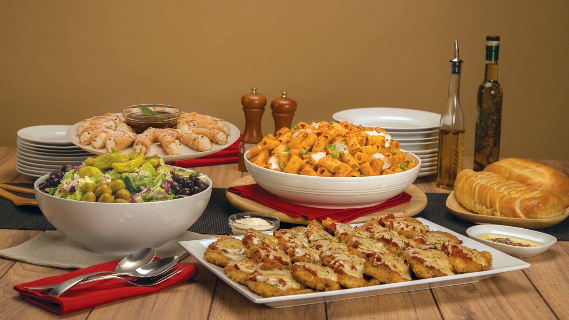 salads, pasta, bread served on a table