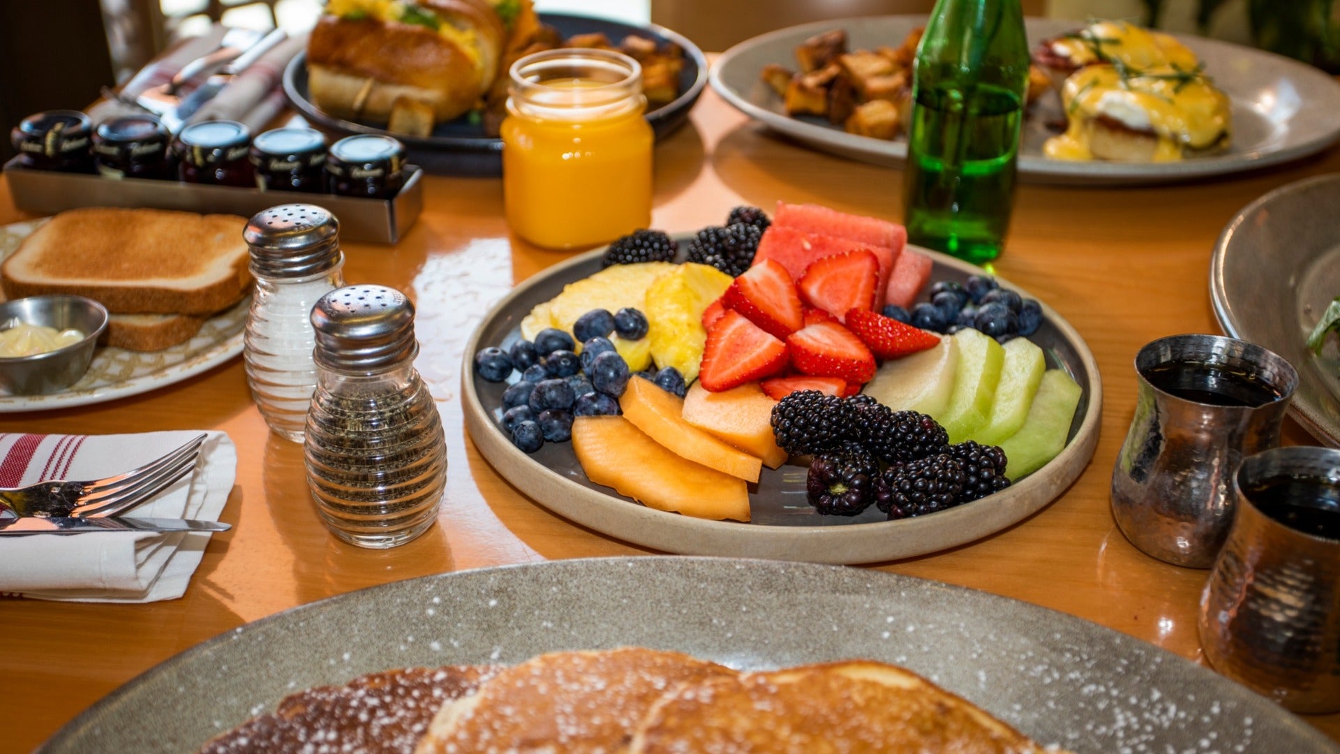 fruits and pancakes platter, breakfast served at Cafe Americano