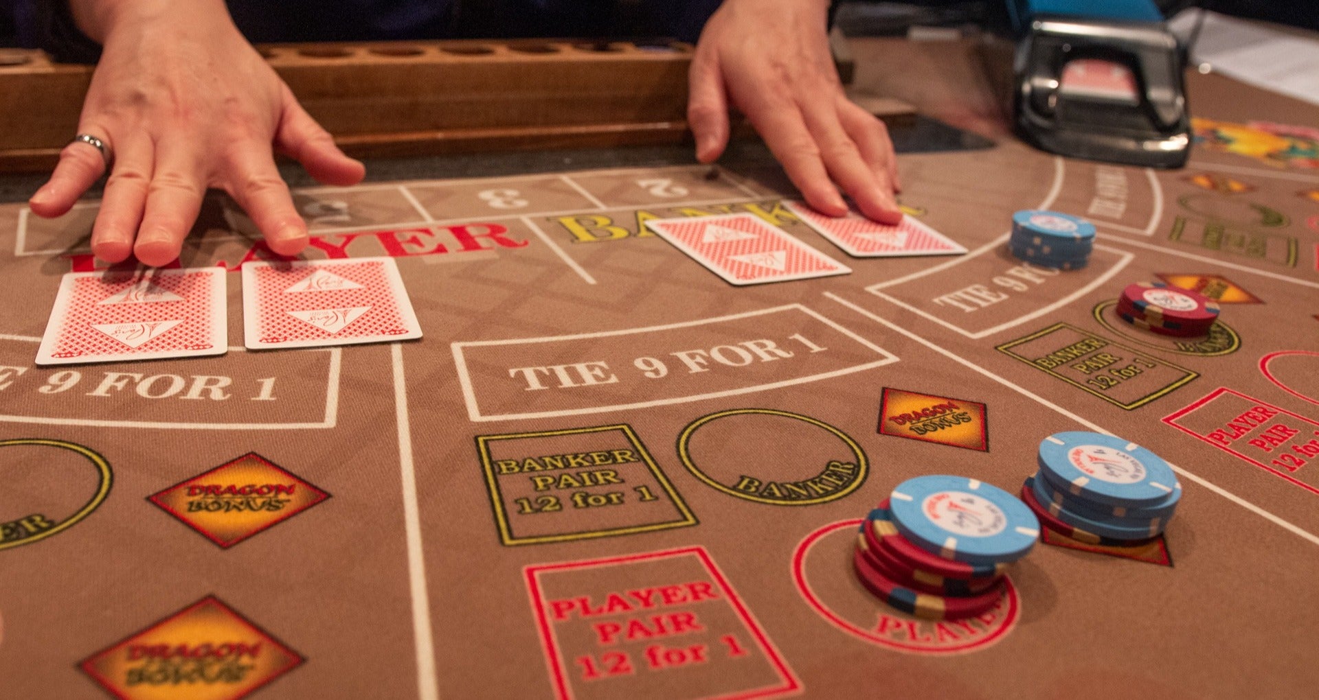 baccarat table at paris hotel casino in las vegas, dealing cards