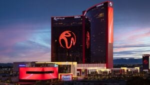 exterior of resorts world las vegas and conrad hotel, buildings below