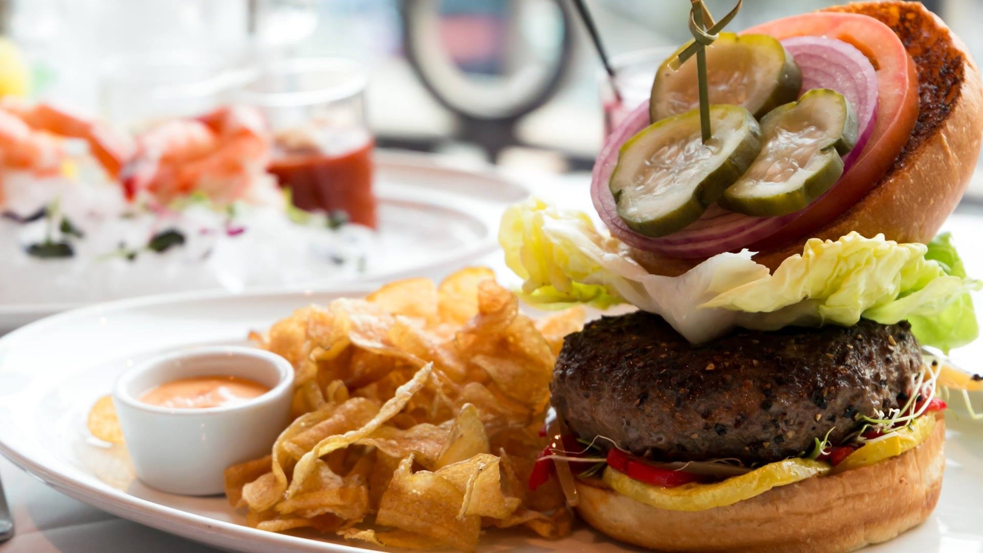 burger, chips, lunch menu item at eiffel tower restaurant in paris hotel, las vegas