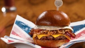 burger with cheese and bacon served on a plate