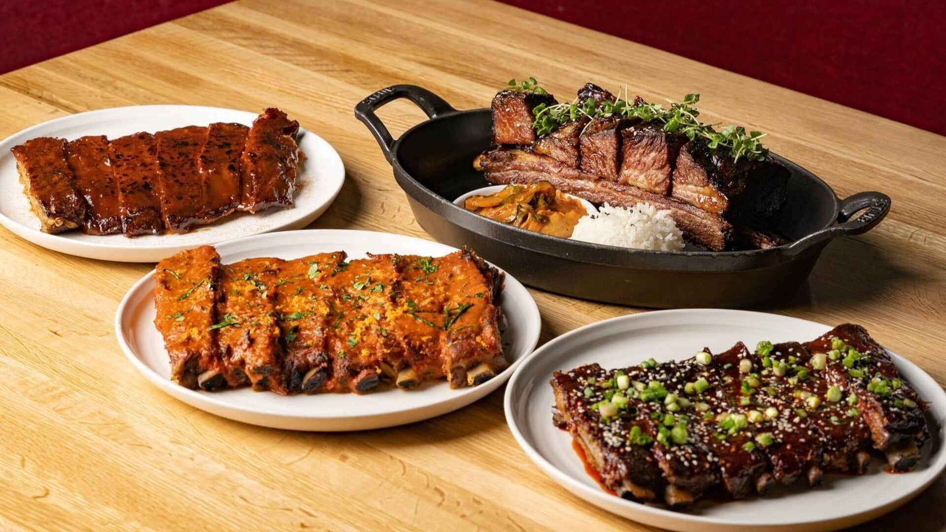 American BBQ, Korean Gochujang and Chipotle Ribs + Korean Style Prime Short Rib, meat served on platters