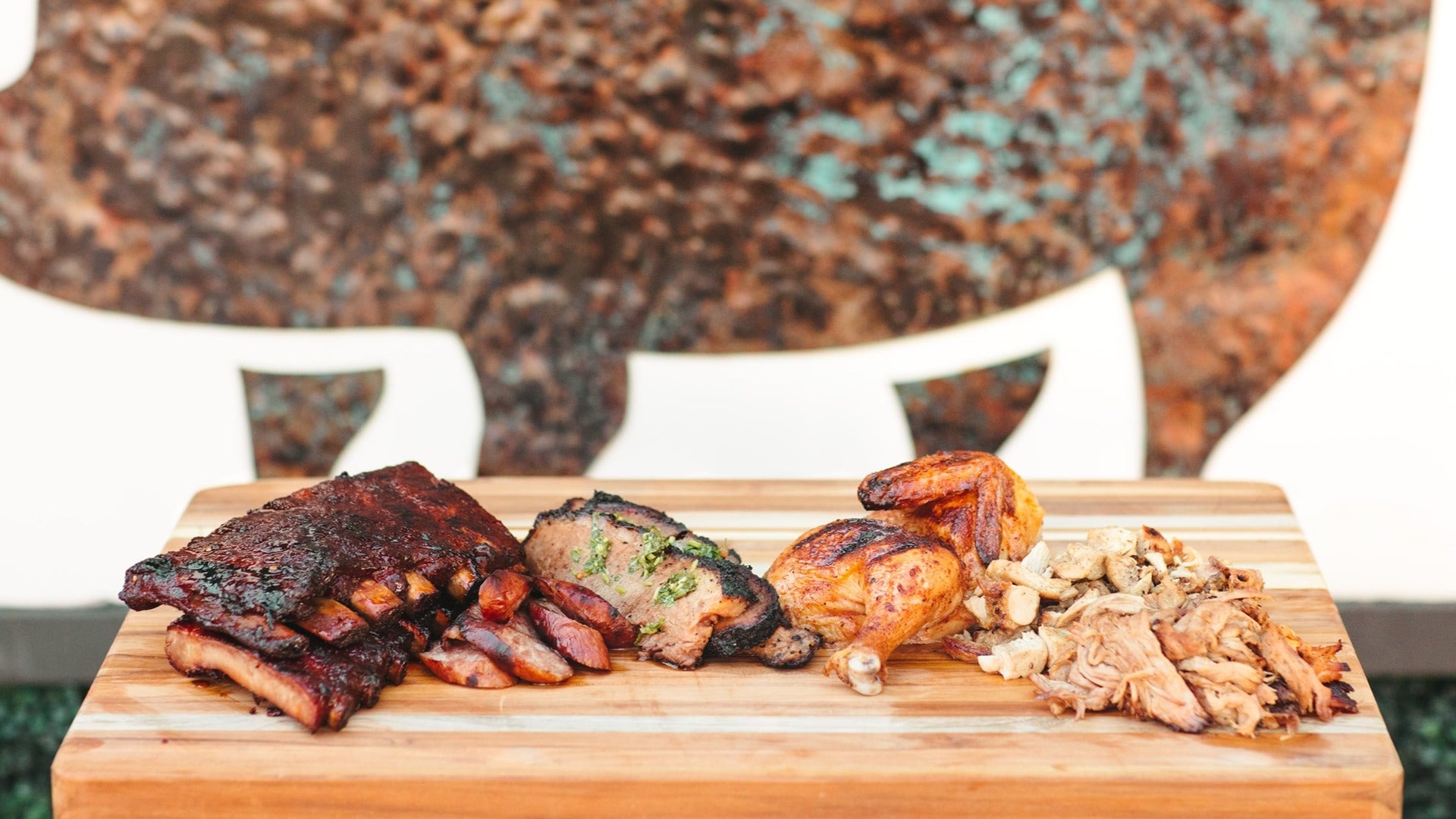 ribs, chicken, various meat on a tray