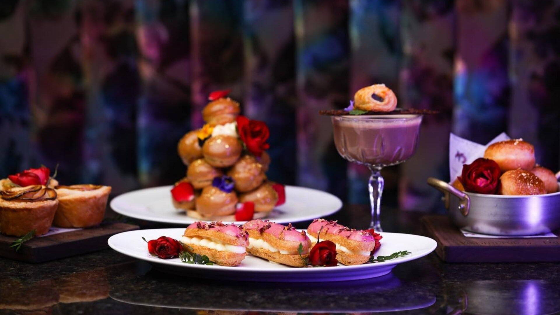 pastries and cocktails with floral garnish at vanderpump paris, paris hotel, las vegas