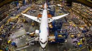 a big white airplane parked