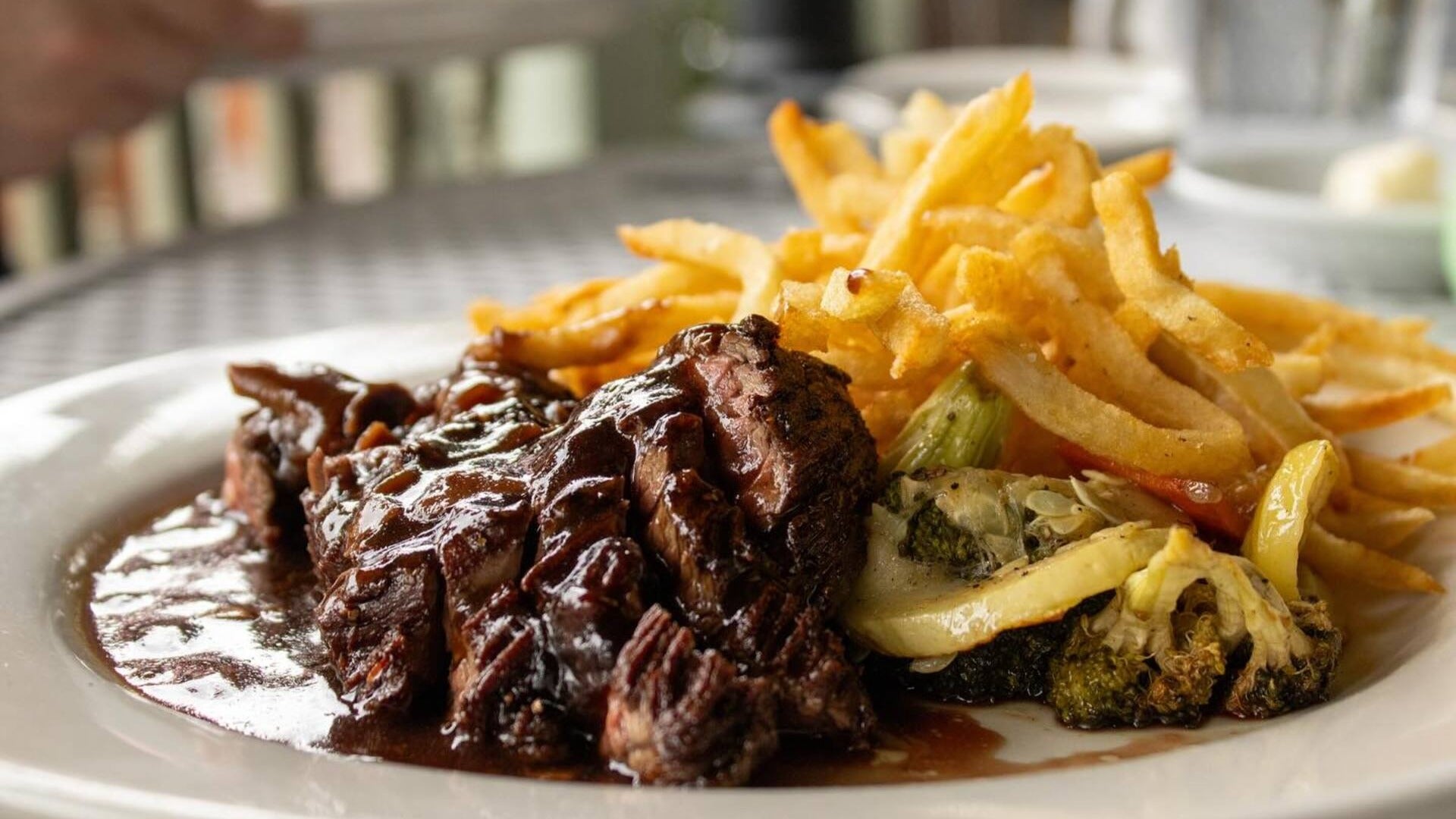 steak and frittas served on a plate