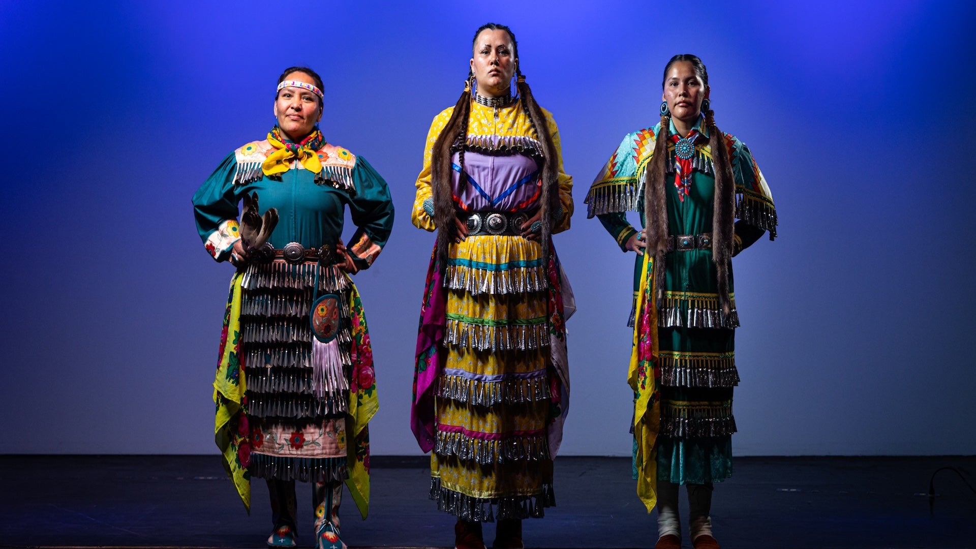 3 indigenous women standing